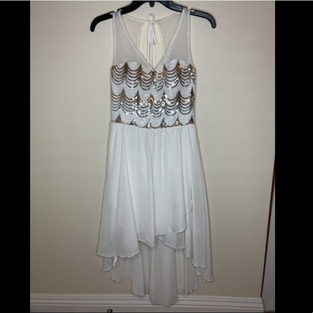 White gold and silver sequined evening dress